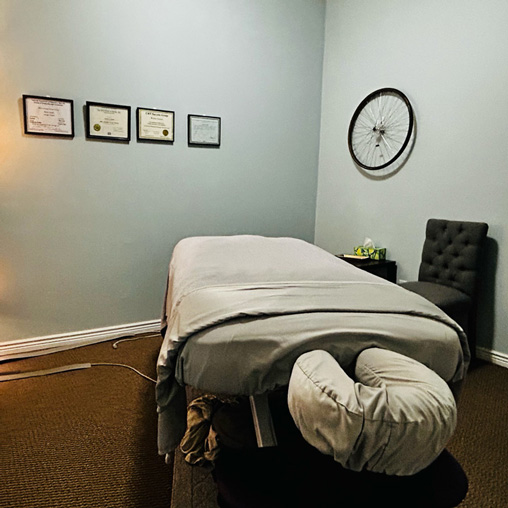 The Focused Bodyworks massage studio with adjustable massage bed